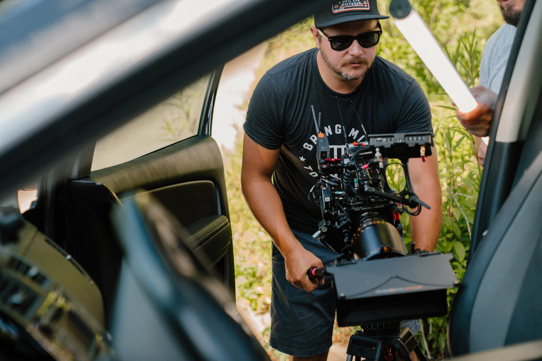 Shot of cameraman filming scene