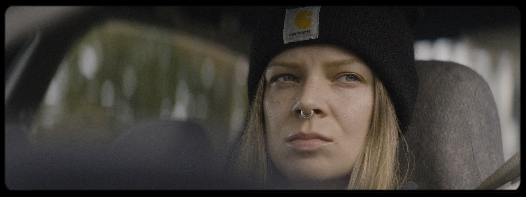 Sarah Shook looks out the window of her vehicle.