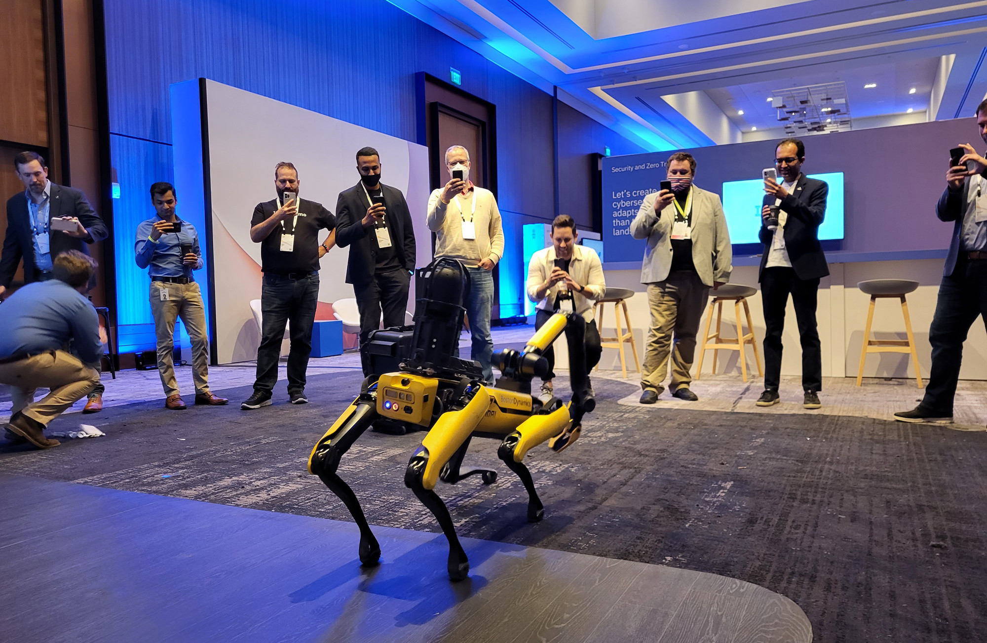 IBM Think conference attendees filming a robot